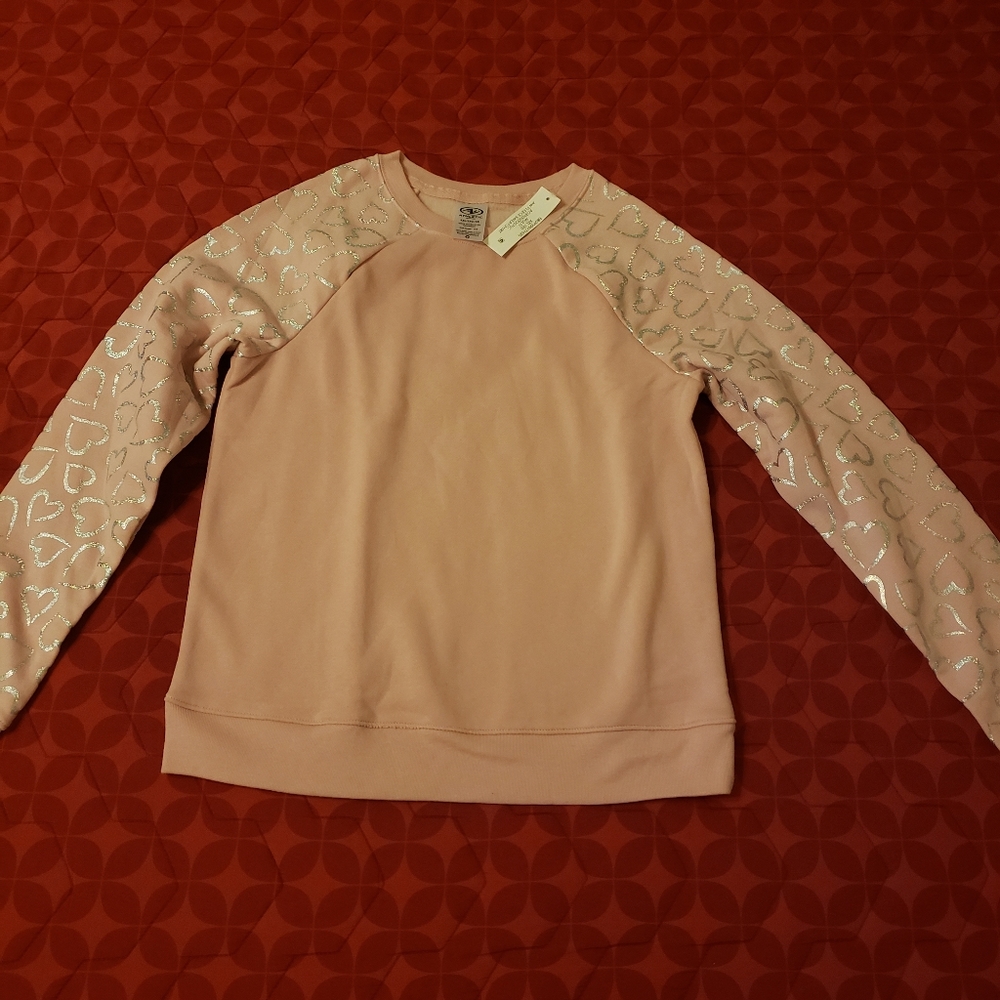 Pink sweater with hearth print in sleeves